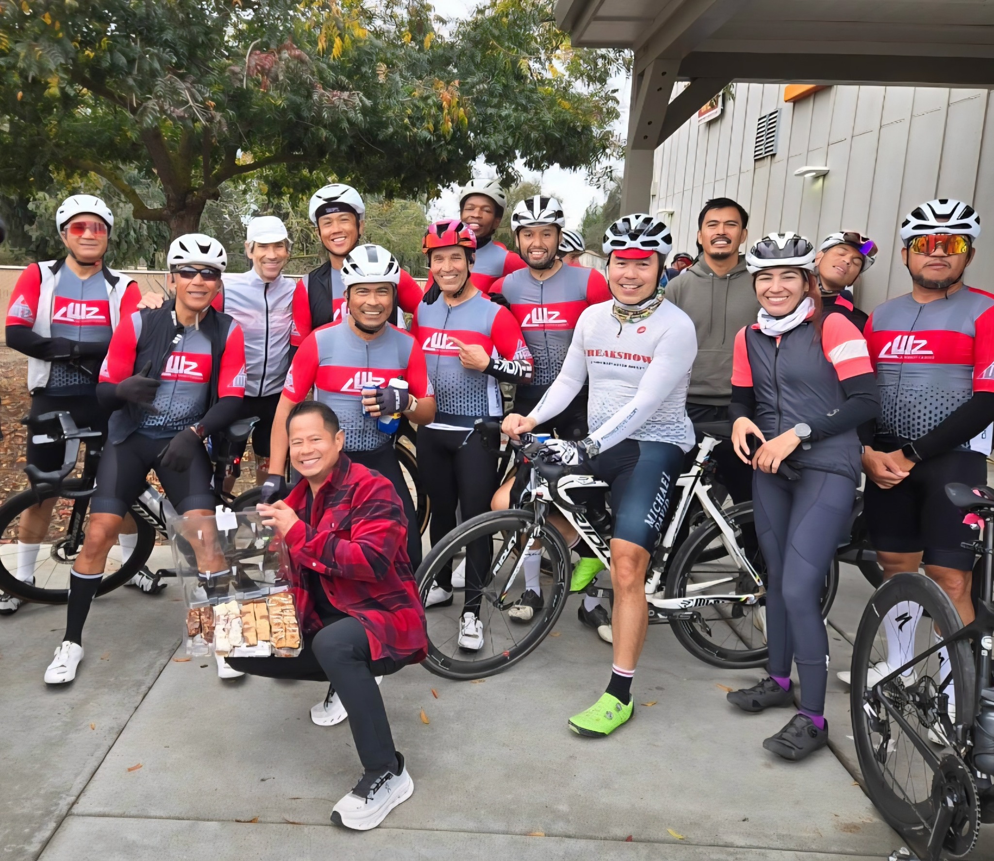 LuckWattZero cyclists sharing a group ride and community moment